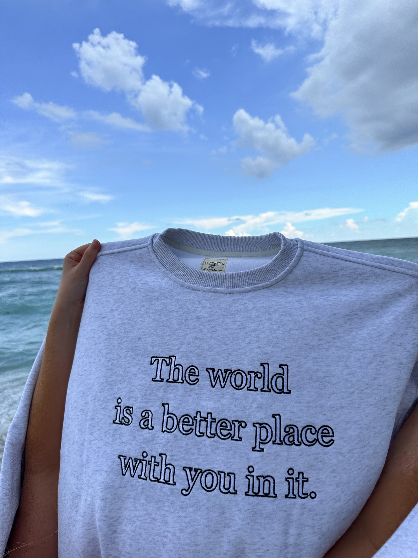 THE WORLD IS A BETTER PLACE WITH YOU IN IT SWEATSHIRT